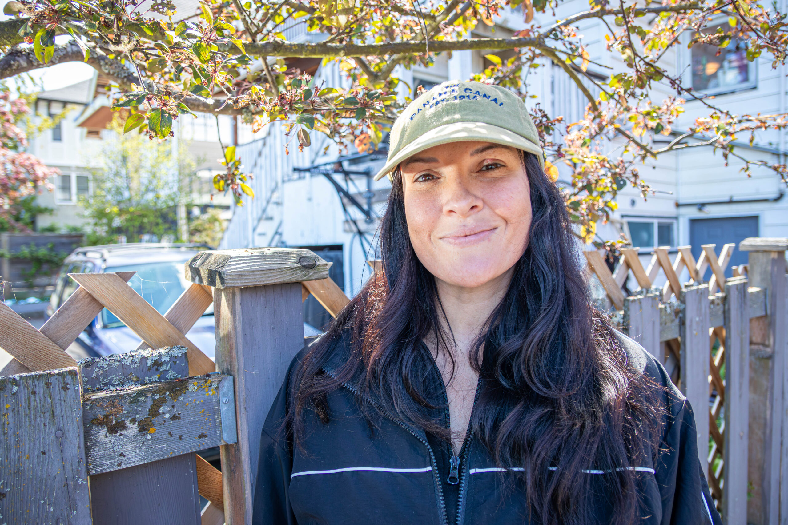 Rachel Barr, Head of Youth Opportunities, VIDEA stands under tree.