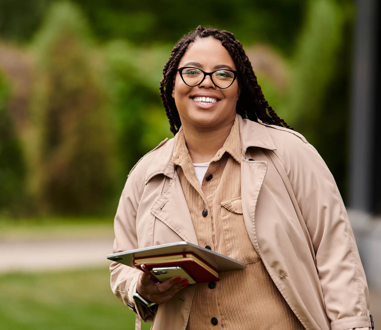 A smiling university student on campus.