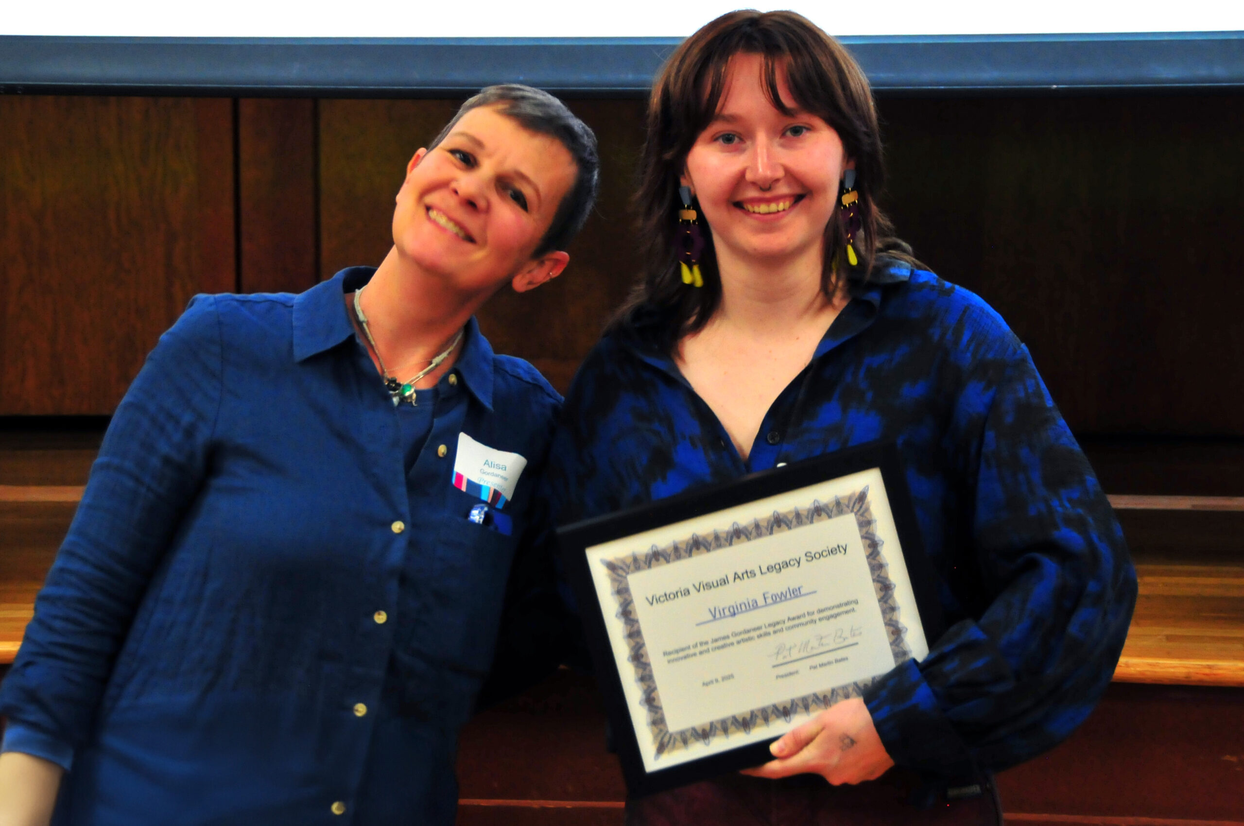 Camosun student Vinny Fowler smiles with her award in hand